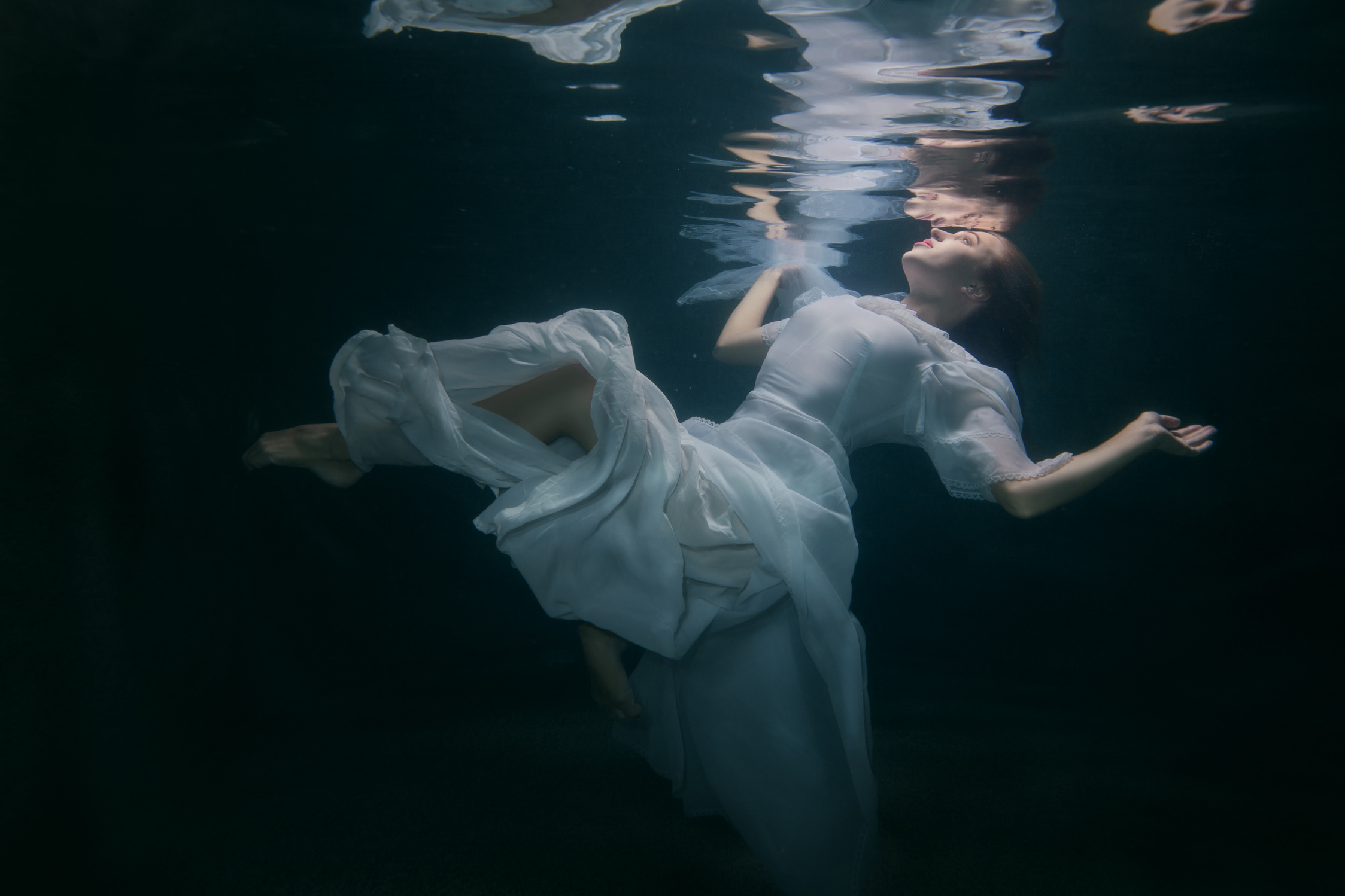Woman under the water.